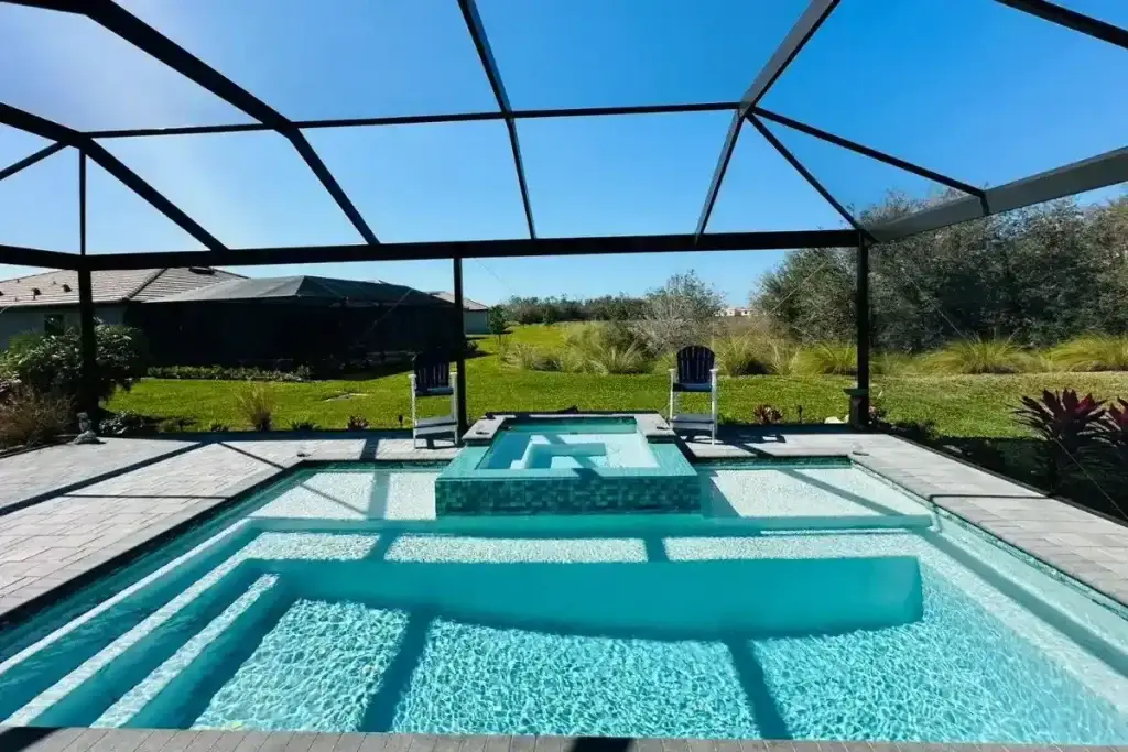 Professional pool installer in Fort Myers completing custom pool construction